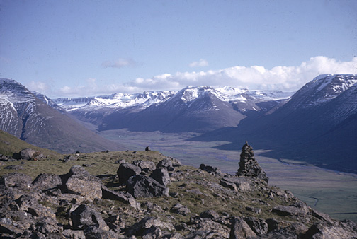 Color photo of cairn and valley, larger version.