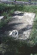 Color photo of grave, small version.