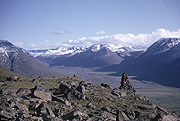 Color photo of cairn and valley, small version.