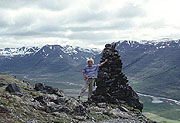 Color photo of author and cairn, small version.