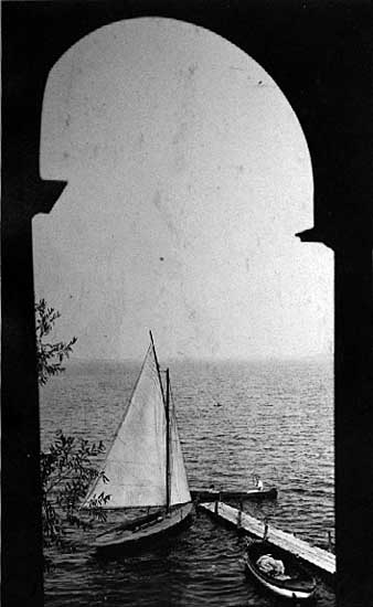 Image of Sailboat through window frame