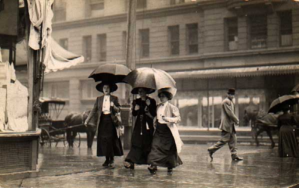 Image of Women walking in rain